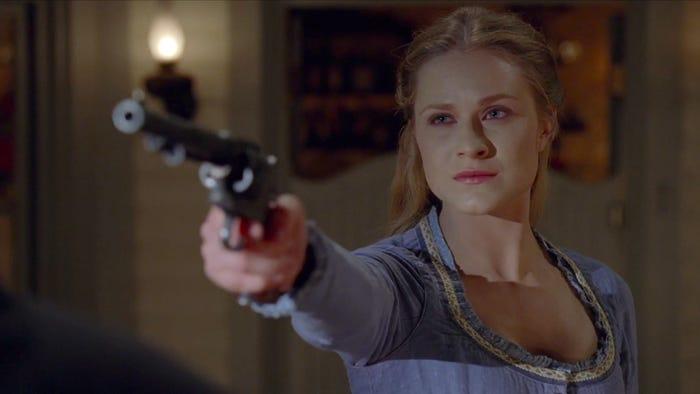 Dolores with a gun