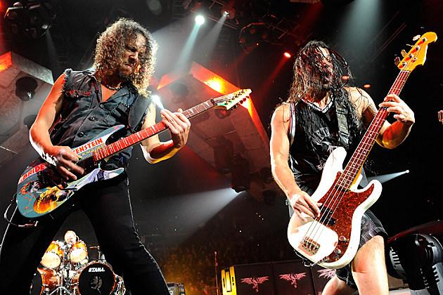 Kirk Hammett and Robert Trujillo of Metallica performing