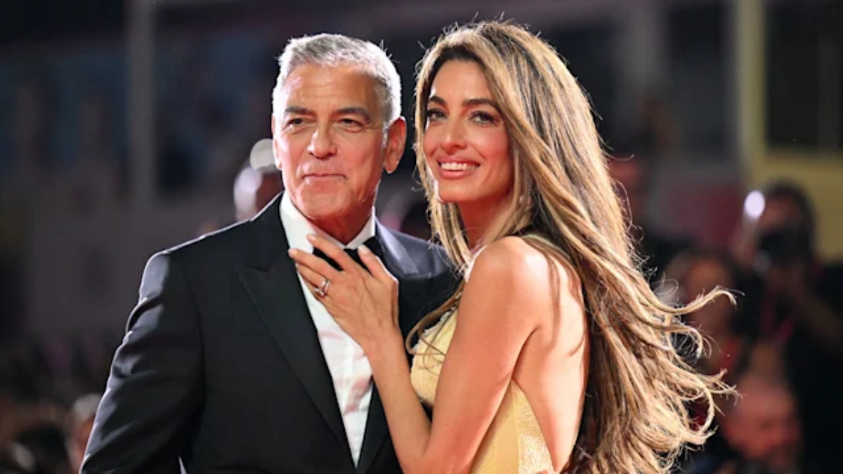 And Amal Clooney Stun in Chic Date Night Outfits at ‘Wolfs